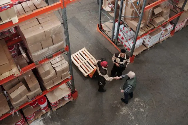 MMP logistics team coordinating shipments in a warehouse